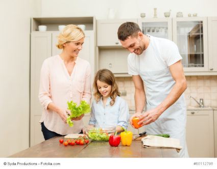 happy family making dinner in kitchen